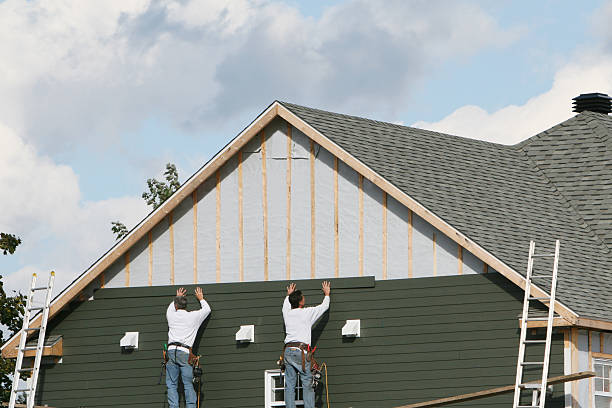Professional Siding technician working in College Park, MD